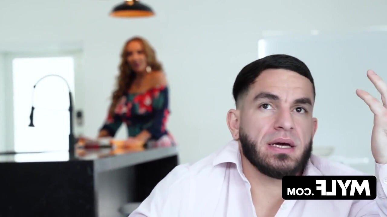 The stepmother reveals her very ample breasts and instructs her stepson on how to satisfy a woman at the peak of her allure.