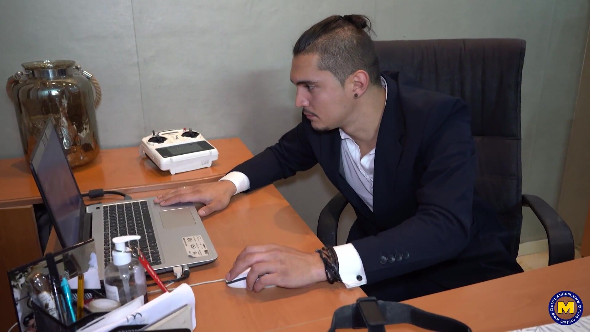 A grown woman, diminutive in stature, named Sara, receives sexual penetration in an aerial position from a younger male partner, Toyboy Cris Angelo.