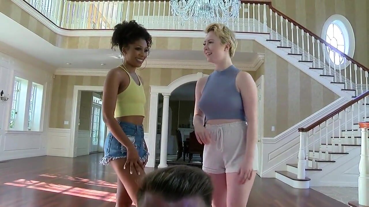 Engaging intimately with her comely companion of African descent