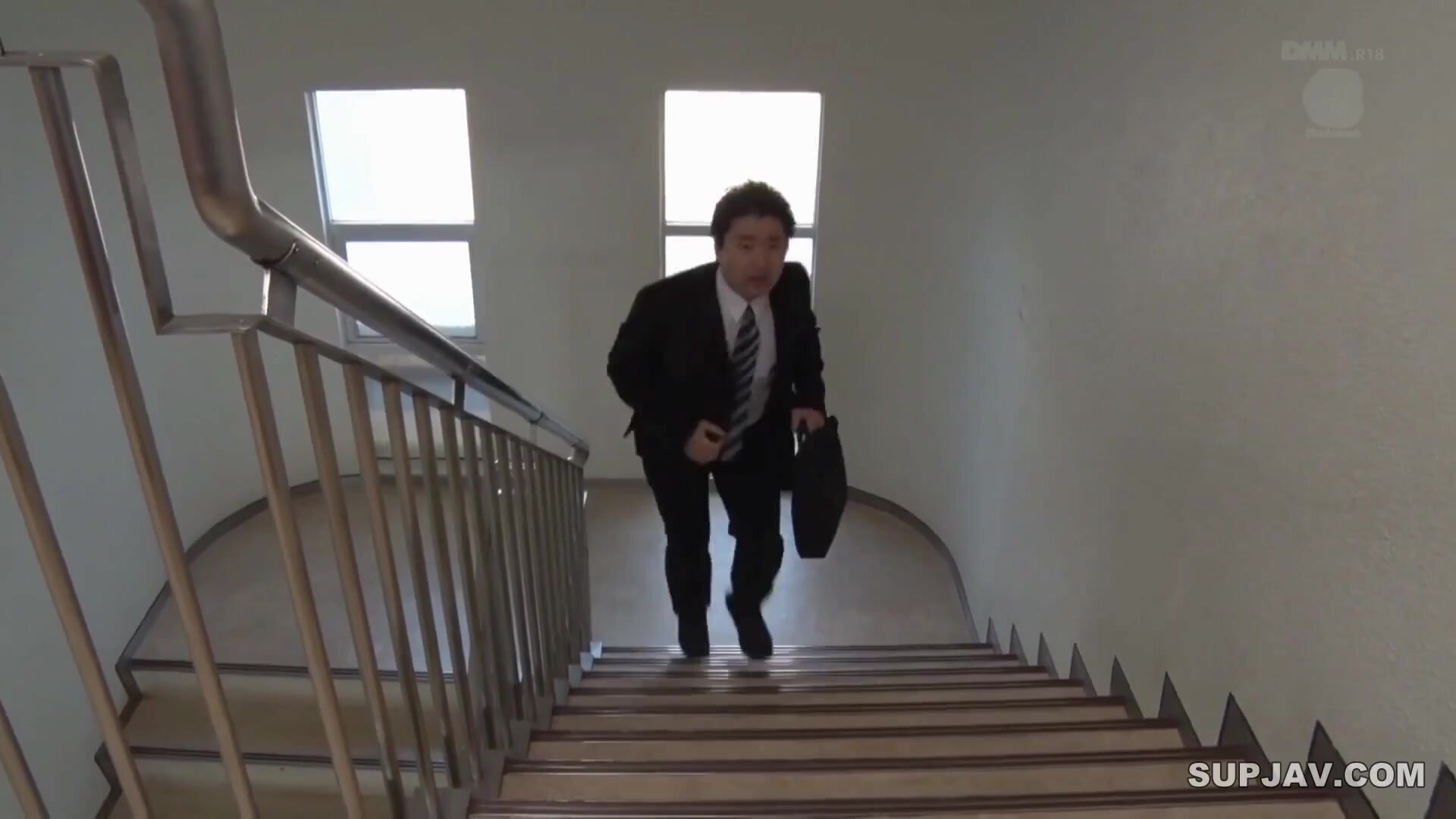 The cleaning lady captivates the new graduates.